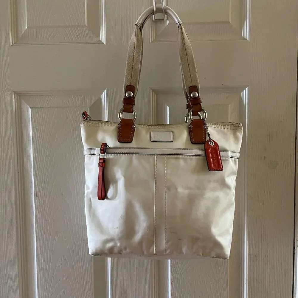 Coach Hampton Beige satin and orange accents satchel with silver tone hardwares